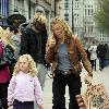 Yummy Mummy and ITV's 'Trial & Retribution' actress Victoria Smurfit seen carrying a Dunnes Stores bag and encouraging her daughter Evie Dorothy Baxter to give money to the buskers outside the St Stephens Green Shopping Centre.
Dublin, Ireland.