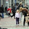 Yummy Mummy and ITV's 'Trial & Retribution' actress Victoria Smurfit seen carrying a Dunnes Stores bag and encouraging her daughter Evie Dorothy Baxter to give money to the buskers outside the St Stephens Green Shopping Centre.
Dublin, Ireland.