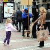 Yummy Mummy and ITV's 'Trial & Retribution' actress Victoria Smurfit seen carrying a Dunnes Stores bag and encouraging her daughter Evie Dorothy Baxter to give money to the buskers outside the St Stephens Green Shopping Centre.
Dublin, Ireland.