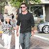 Simon Cowell was spotted out at a restaurant with his Mother. The pop mogul ordered pizza and shared some with a friendly dog which was on the table beside his.
Malibu, USA.