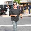 Simon Cowell was spotted out at a restaurant with his Mother. The pop mogul ordered pizza and shared some with a friendly dog which was on the table beside his.
Malibu, USA.