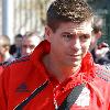 Steven Gerrard
catching a train at Runcorn station as flights out the UK are still halted because of the Icelandic Volcono ash cloud above. The Liverpool football team heading for Spain for their upcomimg UEFA Europa League match against Atletico Madrid.
Cheshire, England.