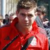 Steven Gerrard
catching a train at Runcorn station as flights out the UK are still halted because of the Icelandic Volcono ash cloud above. The Liverpool football team heading for Spain for their upcomimg UEFA Europa League match against Atletico Madrid.
Cheshire, England.