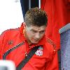 Steven Gerrard
catching a train at Runcorn station as flights out the UK are still halted because of the Icelandic Volcono ash cloud above. The Liverpool football team heading for Spain for their upcomimg UEFA Europa League match against Atletico Madrid.
Cheshire, England.