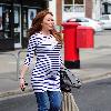 A heavily pregnant Natasha Hamilton
after visiting a hairdressers' salon
Liverpool, England.