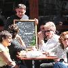 Calvin Klein and friends ordering food at Bar Pitti New York City.