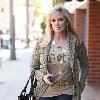 Morgan Fairchild 
walking in Beverly Hills wearing a long gold necklace
Los Angeles, California.