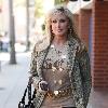 Morgan Fairchild 
walking in Beverly Hills wearing a long gold necklace
Los Angeles, California.