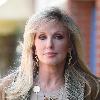 Morgan Fairchild 
walking in Beverly Hills wearing a long gold necklace
Los Angeles, California.