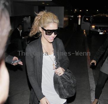 Shakira arriving at LAX airport on a flight from Miami Los Angeles.