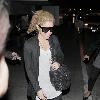 Shakira arriving at LAX airport on a flight from Miami Los Angeles.