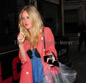 Diane Vickers leaving Radio One, carrying a box of donuts, after getting the number one chart position
London, England.