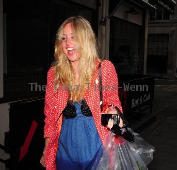 Diane Vickers leaving Radio One, carrying a box of donuts, after getting the number one chart position
London, England.