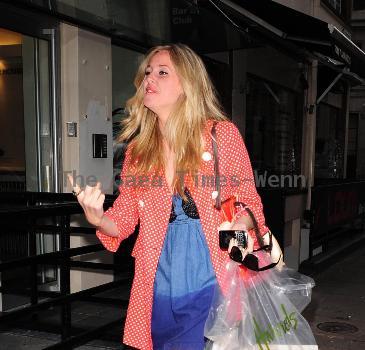 Diane Vickers leaving Radio One, carrying a box of donuts, after getting the number one chart position
London, England.