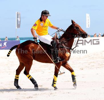 Polo players Brandon Phillips, John gobin and Lance Vetterparticipate in the 2010 AMG South Beach Men Polo World Cup behind The Setai HotelMiami.