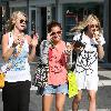 Ashley Tisdale eating ice cream with friends in Malibu Los Angeles, California.