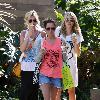 Ashley Tisdale eating ice cream with friends in Malibu Los Angeles, California.