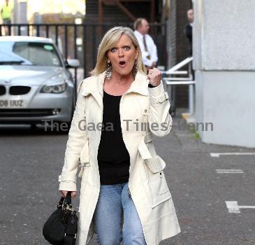 Bernie Nolan leaves the ITV studios after appearing on 'GMTV' London.