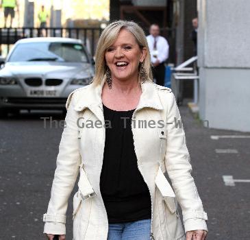 Bernie Nolan leaves the ITV studios after appearing on 'GMTV' London.