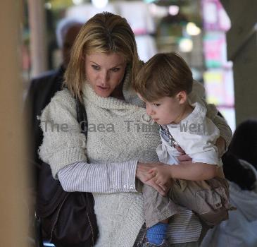 Julie Bowen 
'Modern Family' star eating lunch with her son Oliver Phillips from a Mexican food stand
 Los Angeles, California.