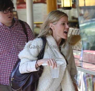 Julie Bowen 
'Modern Family' star eating lunch with her son Oliver Phillips from a Mexican food stand
 Los Angeles, California.