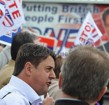 BNP leader Nick Griffin awaits the arrival of David Cameron as the Conservatives  he campaign in Dagenham and Rainham.
London, England.