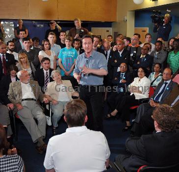 BNP leader Nick Griffin awaits the arrival of David Cameron as the Conservatives  he campaign in Dagenham and Rainham.
London, England.