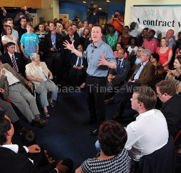 BNP leader Nick Griffin awaits the arrival of David Cameron as the Conservatives  he campaign in Dagenham and Rainham.
London, England.