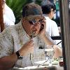 Drew Carey seen talking on the phone while out having lunch at The Grove in Hollywood. Los Angeles.