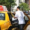 New York Yankees catcher Jorge Posada catches a cab after shopping at Chanel on Madison Avenue New York City.