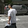 New York Yankees catcher Jorge Posada catches a cab after shopping at Chanel on Madison Avenue New York City.