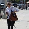 Lake Bell returning to her car with her mother and dog after having lunch at Kings Road Cafe. Los Angeles.