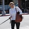 Lake Bell returning to her car with her mother and dog after having lunch at Kings Road Cafe. Los Angeles.