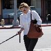 Lake Bell returning to her car with her mother and dog after having lunch at Kings Road Cafe. Los Angeles.