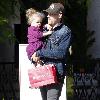 Joel Madden 
carries his daughter Harlow after shopping at the American Girl store in The Grove
Los Angeles, California.