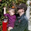 Joel Madden 
carries his daughter Harlow after shopping at the American Girl store in The Grove
Los Angeles, California.