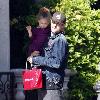 Joel Madden 
carries his daughter Harlow after shopping at the American Girl store in The Grove
Los Angeles, California.