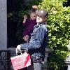 Joel Madden 
carries his daughter Harlow after shopping at the American Girl store in The Grove
Los Angeles, California.