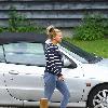 Kerry Katona
outside her house wearing jeggings
Sussex, England.