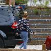 Kerry Katona
outside her house wearing jeggings
Sussex, England.