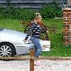 Kerry Katona
outside her house wearing jeggings
Sussex, England.