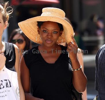 Caroline Chikezie out for lunch at The Grove with a friend Los Angeles.