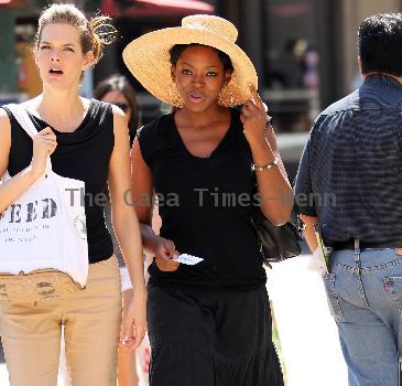 Caroline Chikezie out for lunch at The Grove with a friend Los Angeles.