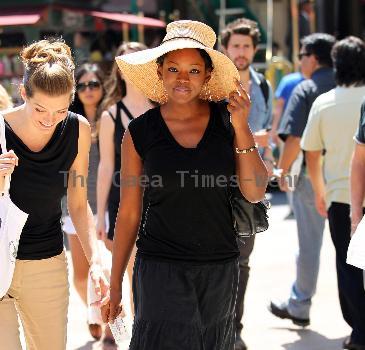 Caroline Chikezie out for lunch at The Grove with a friend Los Angeles.