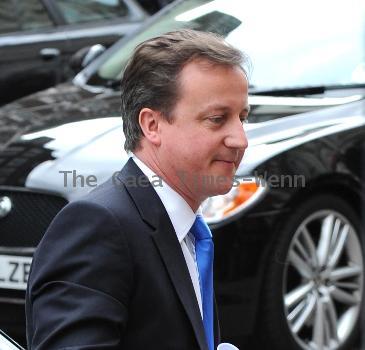 Conservative Party leader David Cameron arriving to make a statement at St Stephen's Club, 
London, England.