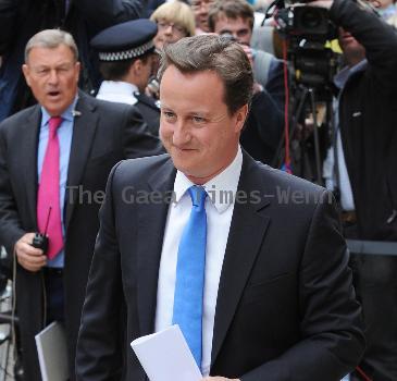 Conservative Party leader David Cameron arriving to make a statement at St Stephen's Club, 
London, England.