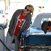 Mischa Barton stops at a gas station to fill up her car in West Hollywood Los Angeles.