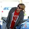 Mischa Barton stops at a gas station to fill up her car in West Hollywood Los Angeles.