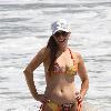 Phoebe Price enjoys the day on Malibu beach Los Angeles.