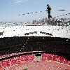 AHDILI LIVES THE HIGH-WIRE LIFE Thrill-seeker Ahdili gingerly crosses a tightrope high above China's famous Bird's Nest – as he bids to spend 60 days living in a tiny cabin on the roof.  Daredevil Ahdili, hailed as the Prince of Tightrope Walking in his native country, crossed from one side of the Beijing National Stadium to the other as nervous onlookers watched from below.  He is planning a feat of endurance – by living in a nine-metre box on top of the arena for the next two months to set a new world record. (ZN/WN)